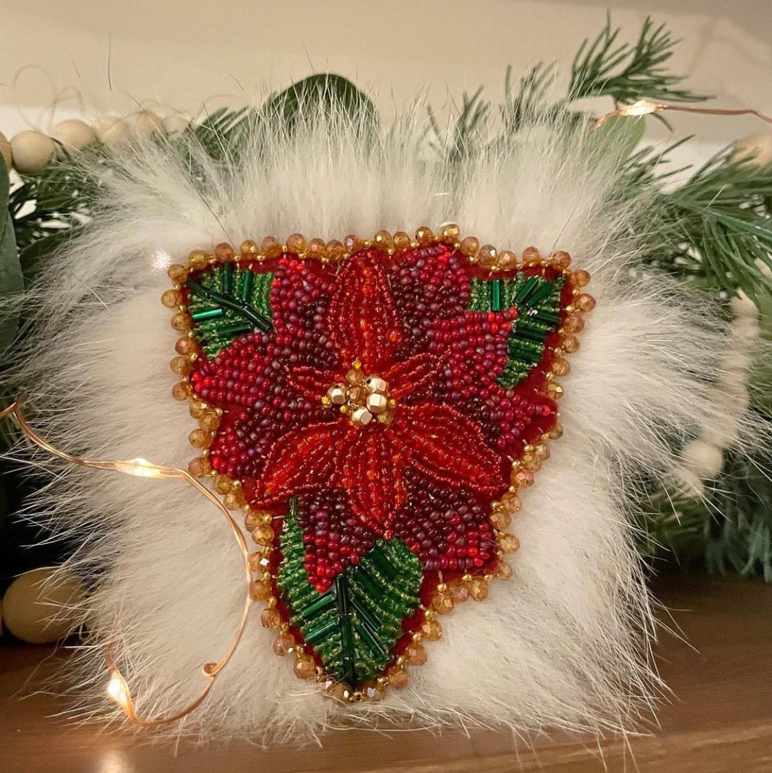 Minister Carolyn Bennett Custom Beaded Poinsettia with White Fox Fur